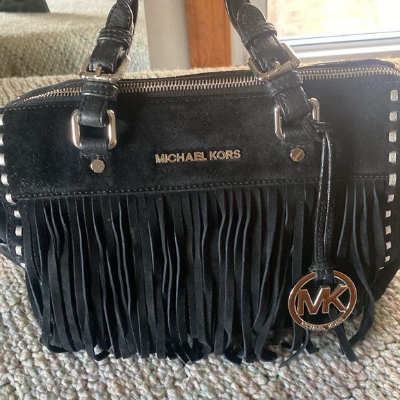 Michael Kors Handbags - 🦊Kors black suede fringed bad. GUC. Silver stiching.